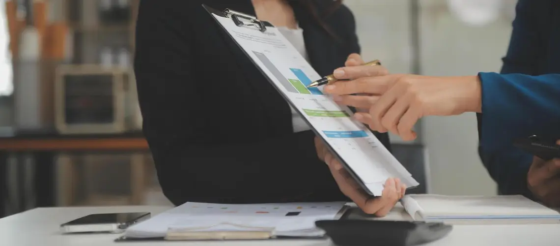Professional valuer preparing a business valuation report in Canberra
